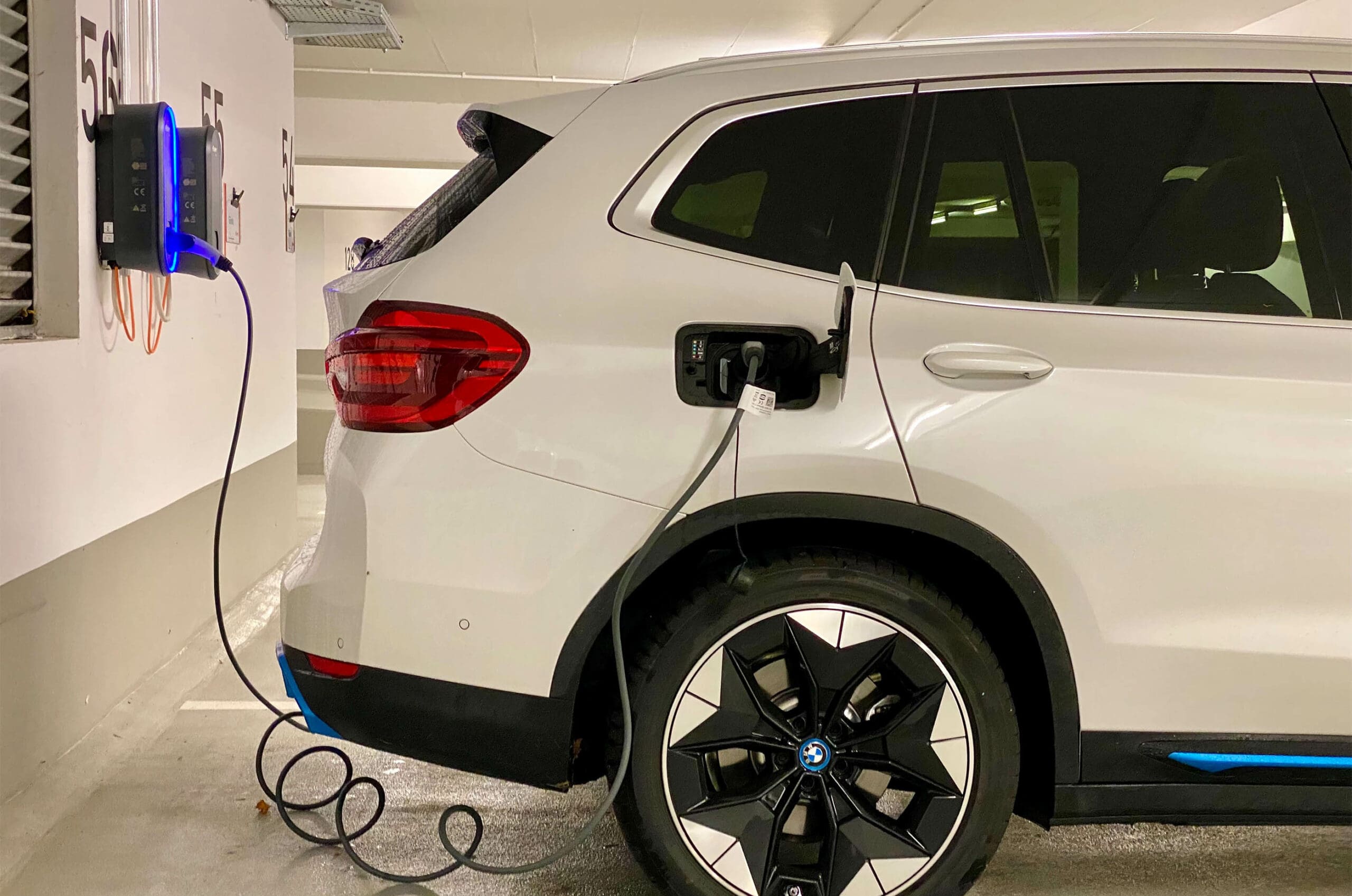 BMW EV charging in parking structure
